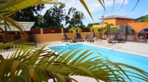 Appartement d'une chambre a Deshaies a 900 m de la plage avec piscine partagee jardin clos et wifi